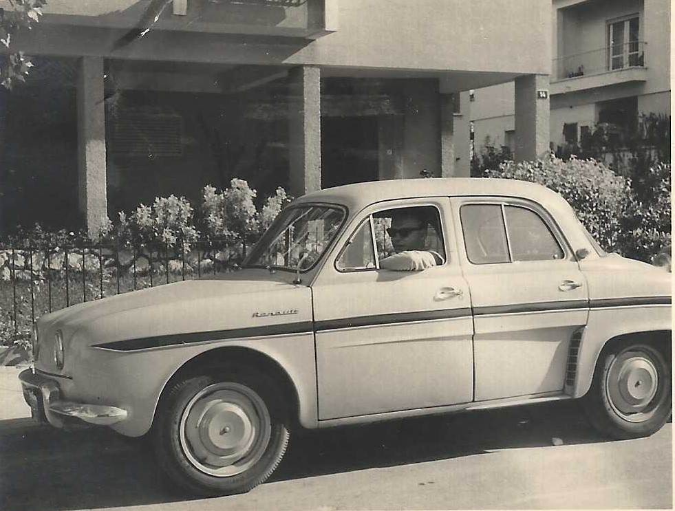 Jean showing off the Dauphine Car 1961